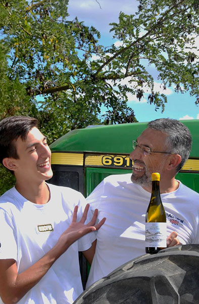 photograph of the Gaetano di Carlo family next to their tractor